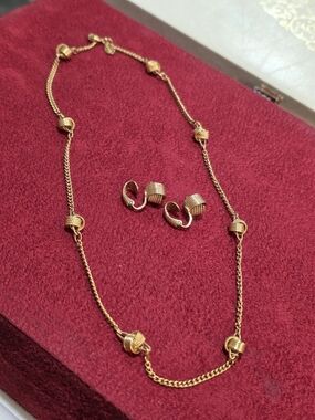Avon Gold-Tone Delicate Lo E Knot Necklace with Clip-On Earrings-signed